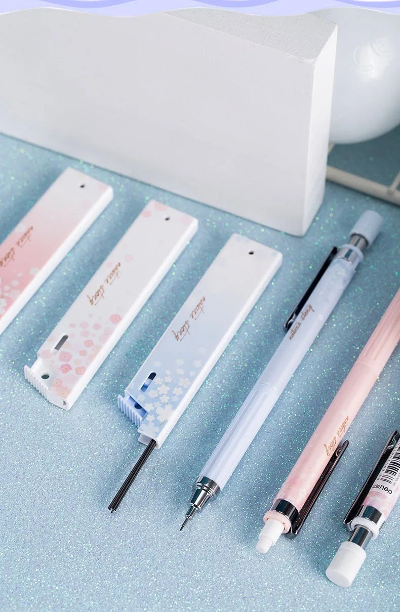 0.5mm automatic pencil set with Sakura cartoon design showing three pens and three HB refill boxes