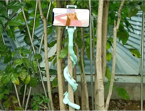 Black flexible rubber phone holder with long 62cm arm and suction cup, holding a mobile phone at an angle.