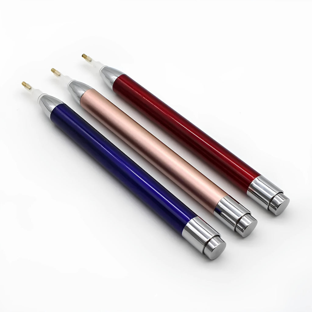 Luminous single-head diamond painting drill pen in gold, red, or blue with metal frame.
