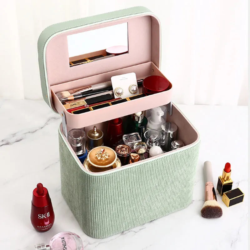 Large corduroy fabric cosmetic storage box with a polyester cotton lining.
