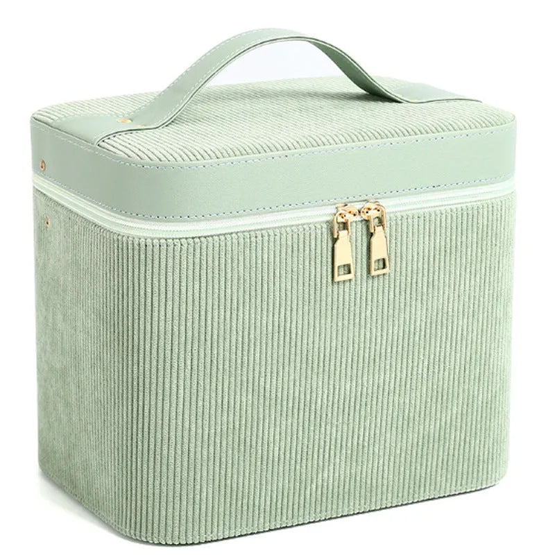 Large corduroy fabric cosmetic storage box with a polyester cotton lining.