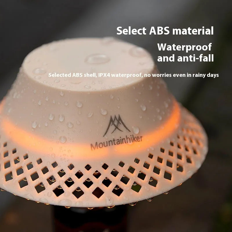 Wine bottle shaped camping lantern in beige colour with USB-C charging port