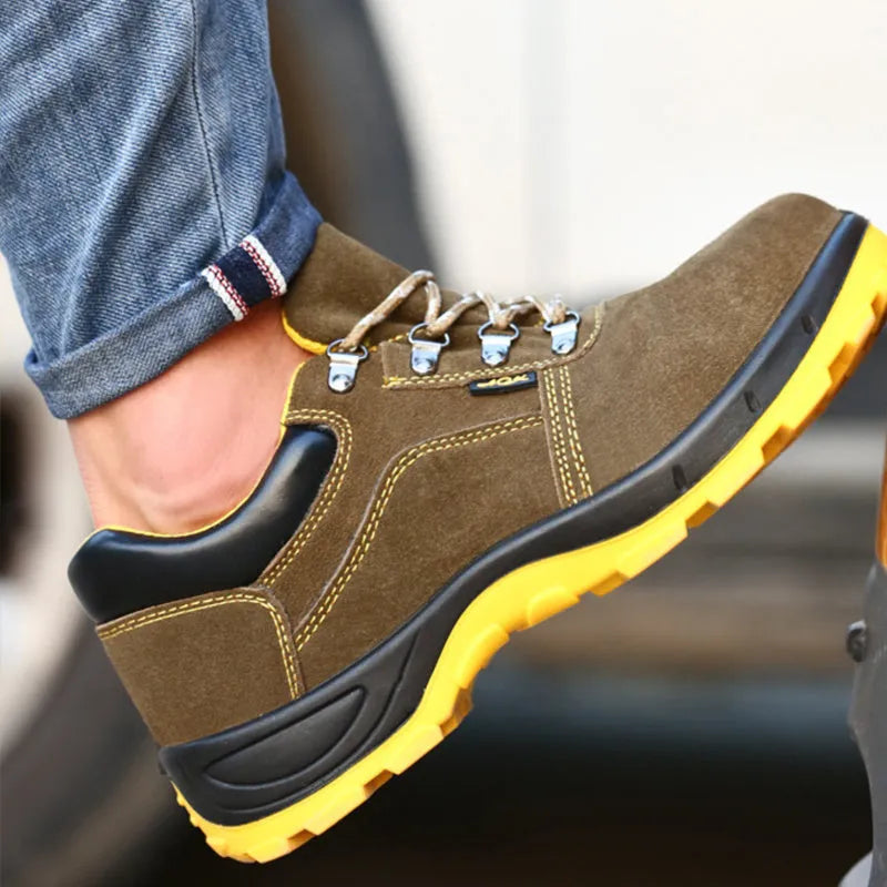 Bronze coloured cow suede leather safety boots with a steel toe cap on a non-slip sole.