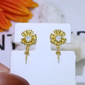 Baroque-style S925 sterling silver floral jewellery holder with pair of earrings on silver frame.