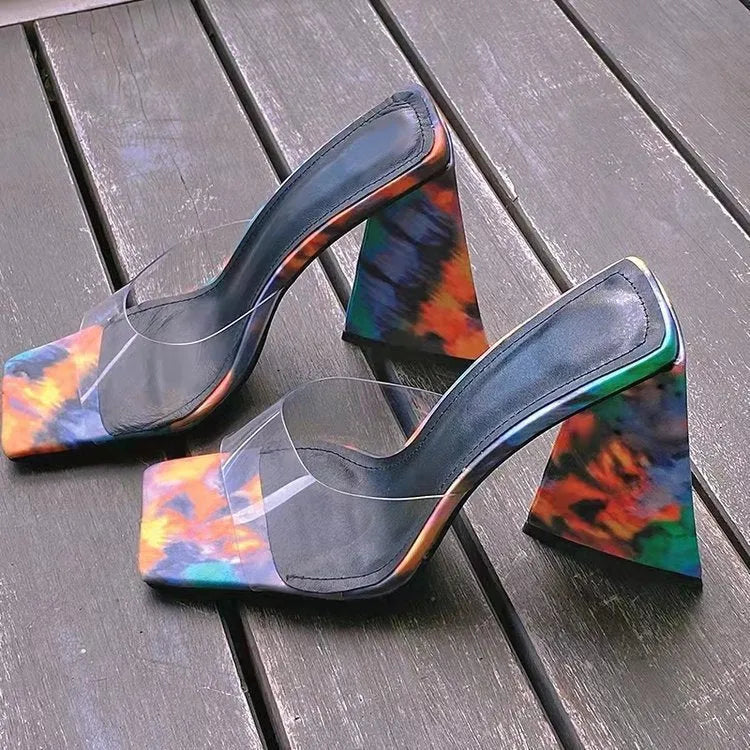 Women's black square toe high heel slippers with a thick triangle heel and rubber sole.