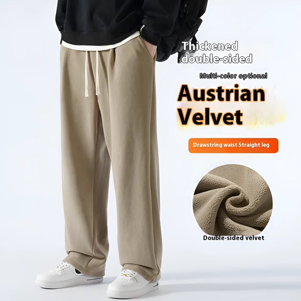 Men's apricot double-sided polar fleece-lined loose fit winter sports trousers on a hanger