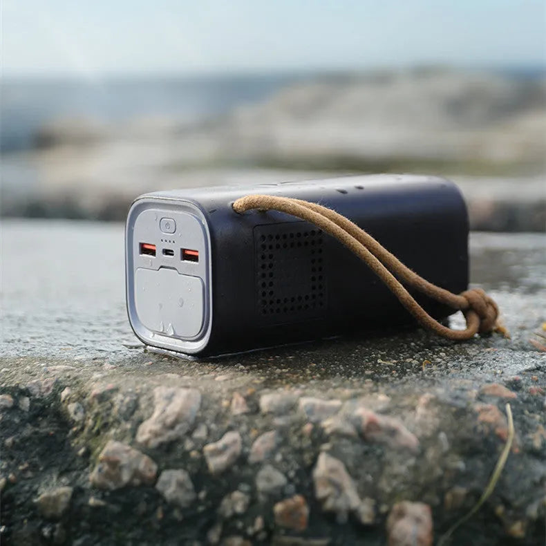 Black emergency power bank with 20000 mAh capacity and 200W output for outdoor and travel use