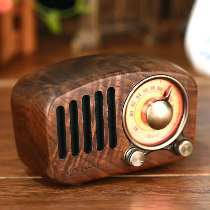 Retro wooden wireless mini speaker in cherry wood or walnut finish with 5W output and Bluetooth connectivity