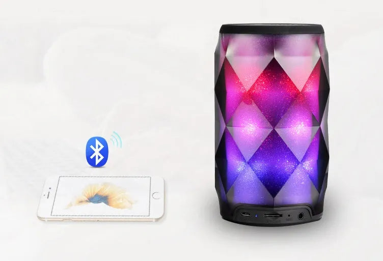 Black crystal diamond cut Coca-Cola can shaped lantern with Bluetooth speaker and colourful LED lights.