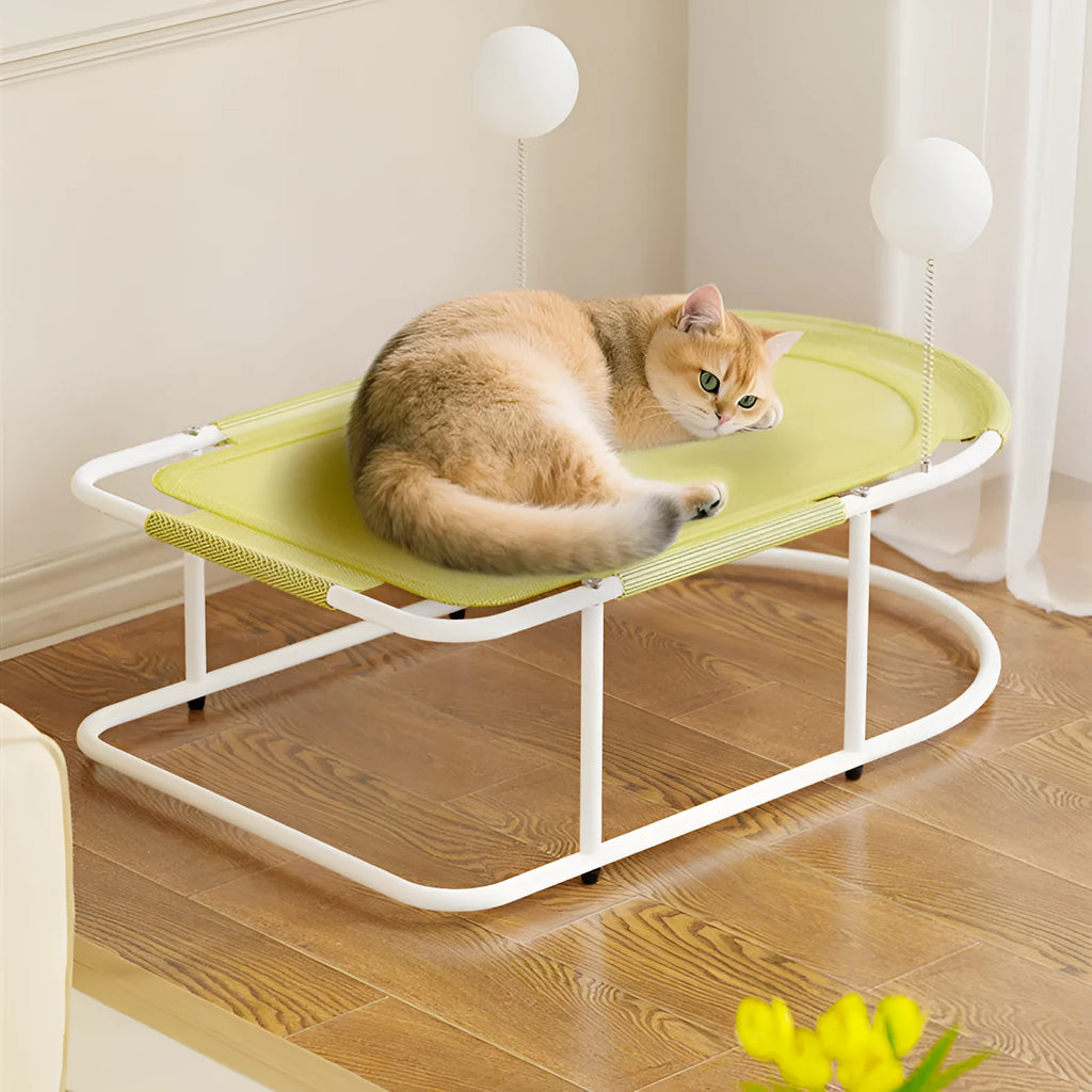 Large grey fabric kennel cage bed for a cat resting inside.
