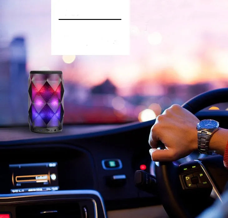 Black crystal diamond cut Coca-Cola can shaped lantern with Bluetooth speaker and colourful LED lights.