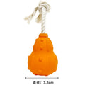 Natural rubber stuffable dog chew toy with a long strap for small to medium dogs.