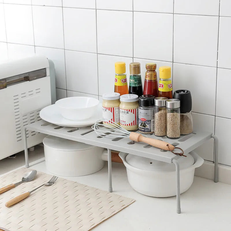 Telescopic plastic kitchen rack in white, adjustable height 36-69cm, floor-standing with Japanese style