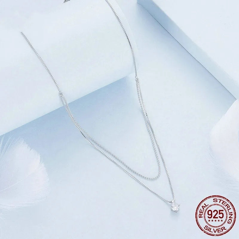 Sterling silver necklace with double-layer pendant and pearl chain style