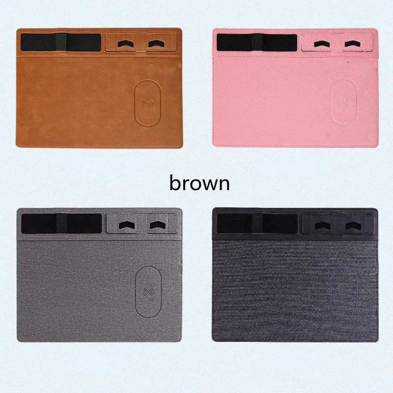 Pink wireless charging mouse pad with phone holder on a wooden desk