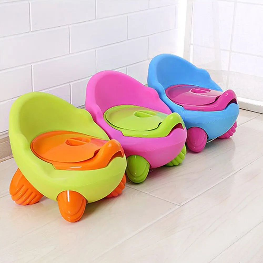 Dandan cartoon-style baby training toilet and stool in one of six available colours.