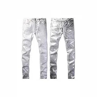 Black slim fit skinny jeans on a man, showing straight leg cut and manual distressing details.