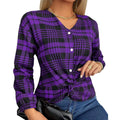Woman wearing a loose-fitting purple plaid casual shirt with regular sleeves.