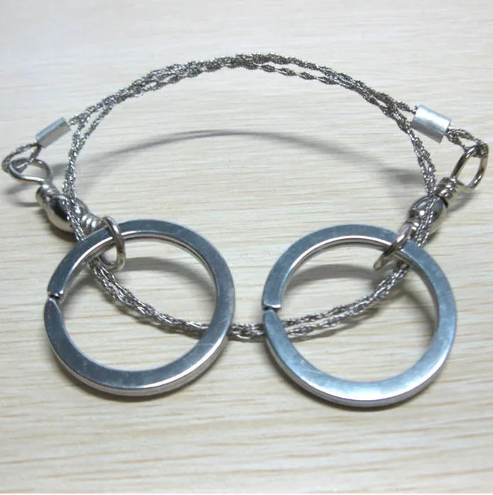 55cm survival wire saw with stainless steel blade and thumb rings for outdoor cutting