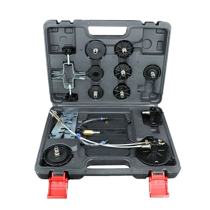 Pneumatic brake fluid replacement machine with large tank, pressure gauge, and regulator on a metal chassis.