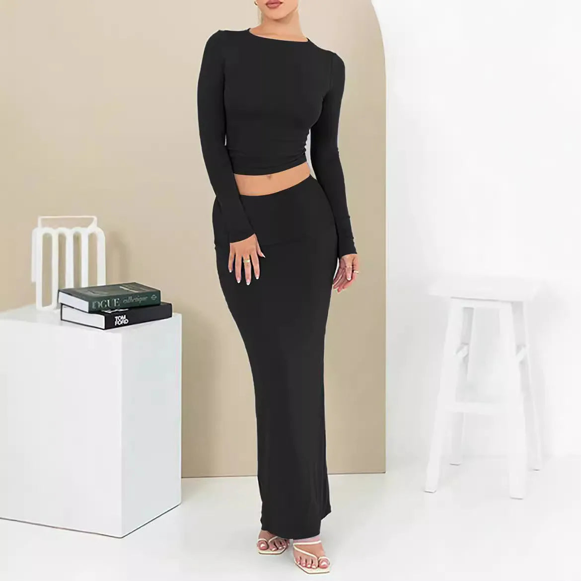Women's autumn two-piece suit in sweet style, showing three-quarter sleeve top and long skirt.