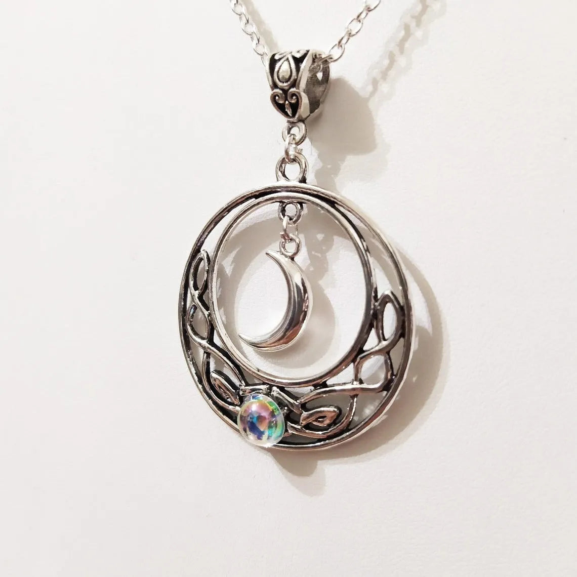 Celtic crescent crystal necklace for women with alloy cross chain and glass moon pendant in colour AQ-3073