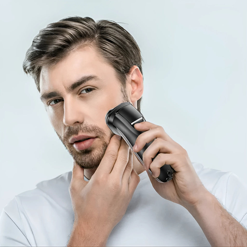 Men's electric shaver with three rotating floating cutter heads and pop-up sideburn trimmer