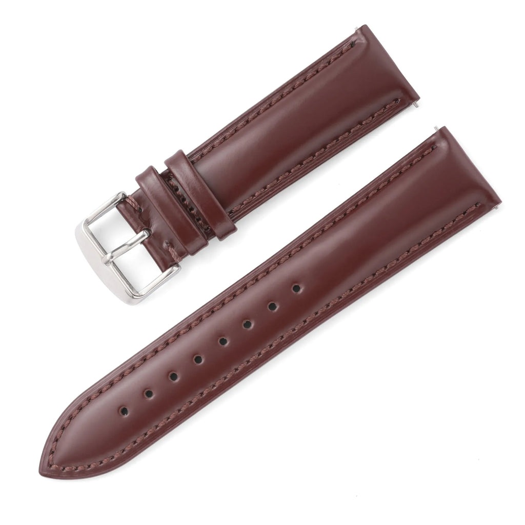 Quick release leather watch strap in dark brown with buckle and quick-release spring bars visible
