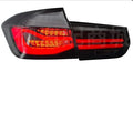 BMW 3 Series aftermarket tail light assembly with red lens and integrated streamer LED running light design.