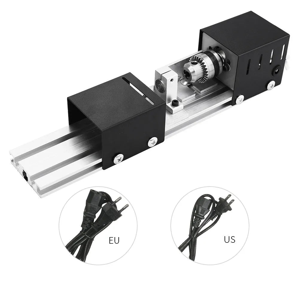 Silver metal mini woodworking lathe with carving tools on workbench