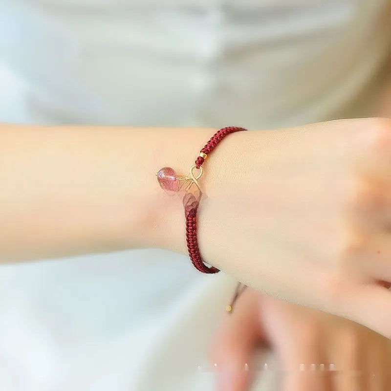 Natural strawberry quartz bracelet with cherry charm and adjustable string closure