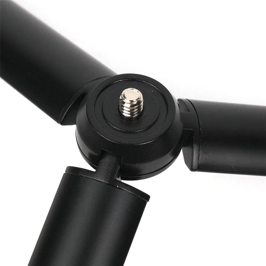Black aluminium alloy mobile phone tripod stabiliser with PTZ functionality compatible with Apple iPhones
