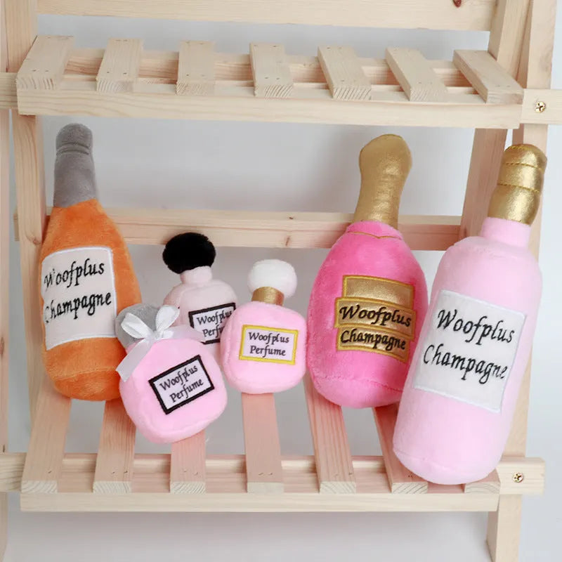 Soft green plush pet toy shaped like a wine bottle for cats and dogs to play with.
