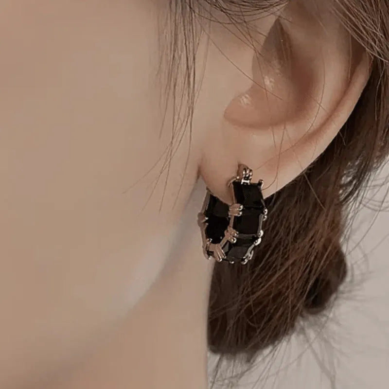 Women's geometric U-shape copper stud earrings with round crystal zircon stone