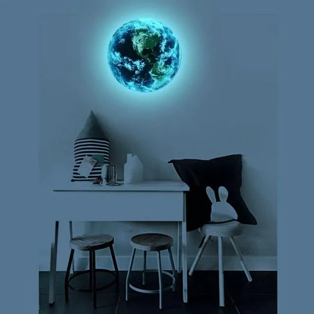 Glow in the dark 3D planet Earth wall sticker in 30cm diameter on a dark blue wall.