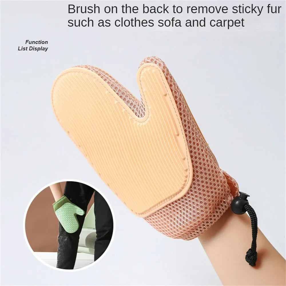 Dark blue pet grooming and hair removal glove made of mesh and TPR for cats and dogs.