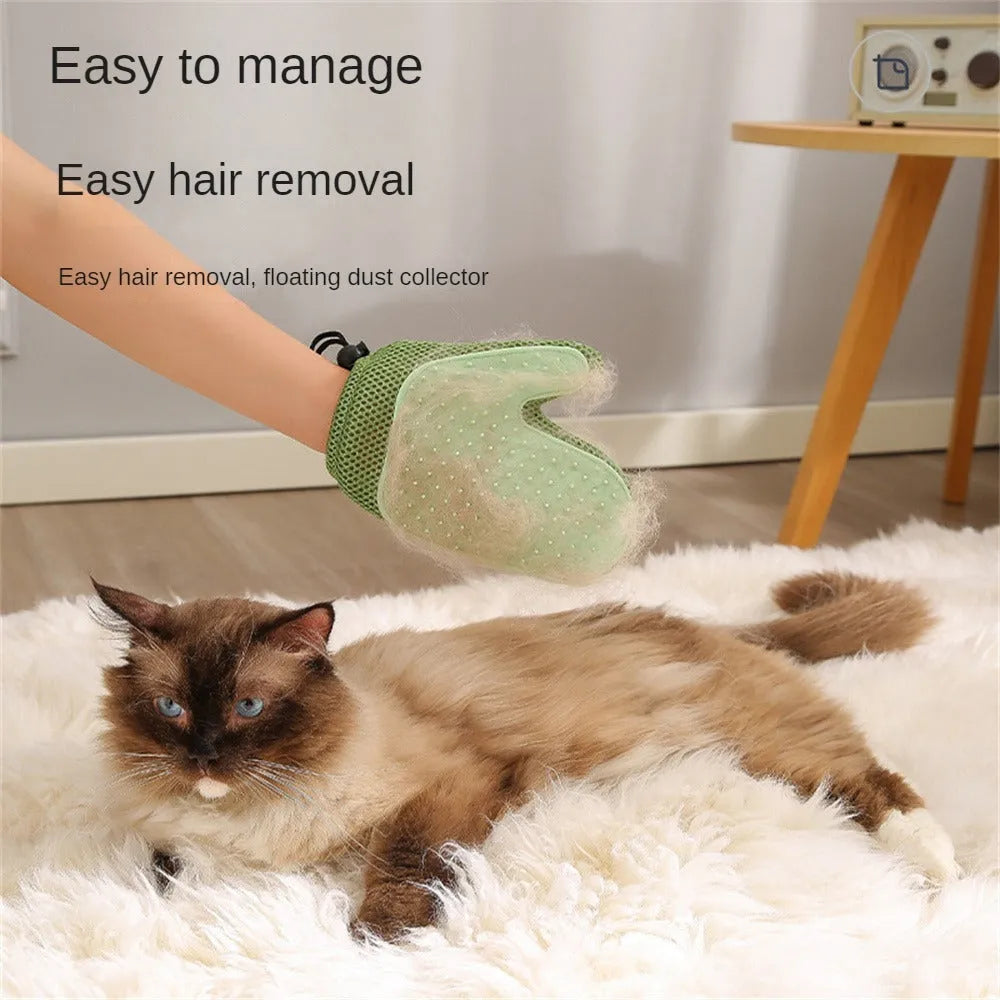 Dark blue pet grooming and hair removal glove made of mesh and TPR for cats and dogs.