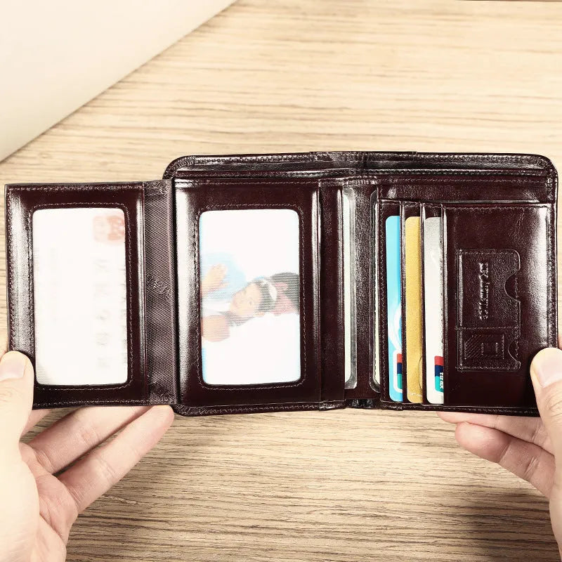 Men's leather wallet showing multiple compartments including banknote folder and card slots
