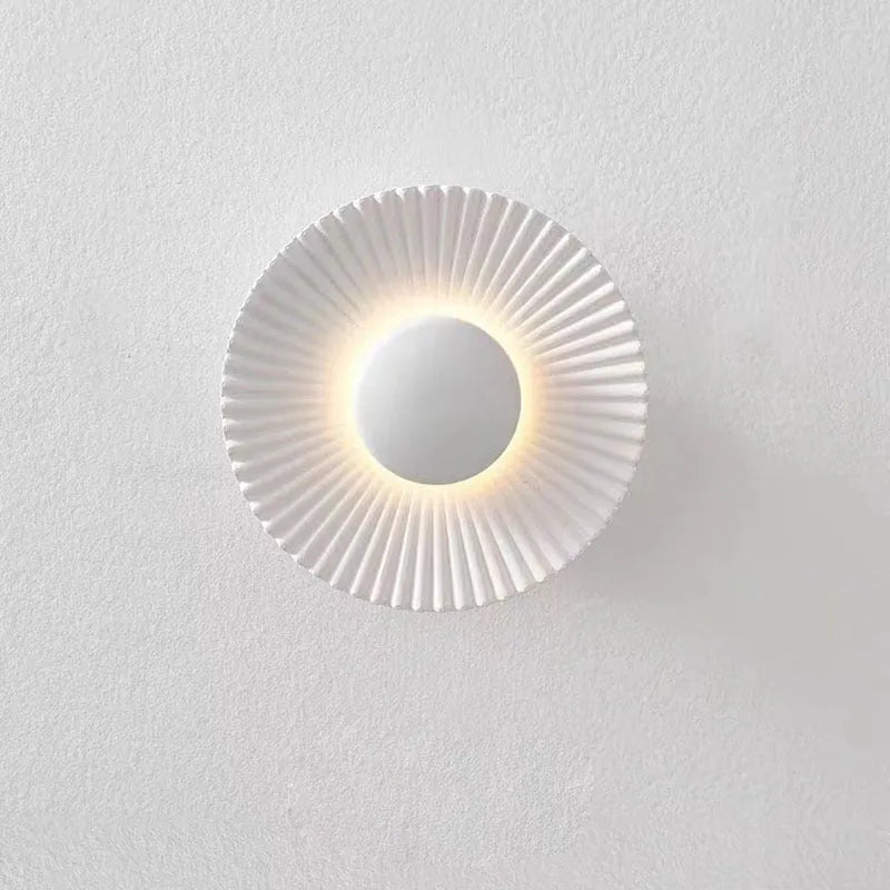 Round aluminium wall lamp with LED lighting in multiple colour variations including gold and white combinations