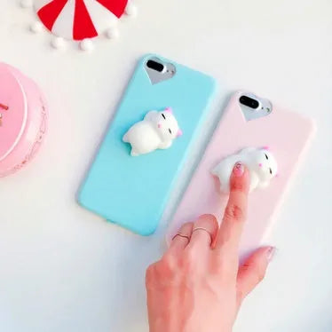 Soft silicone TPU iPhone case with 3D cartoon cat design for multiple iPhone models.