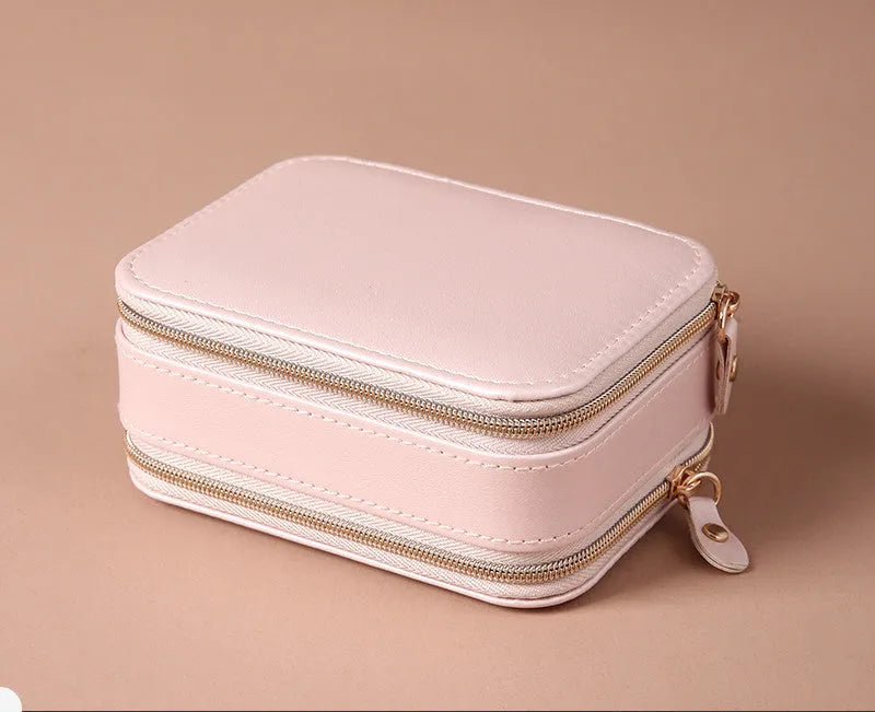 Portable double-sided travel jewellery box in blue with PU leather exterior and pearl velvet lining