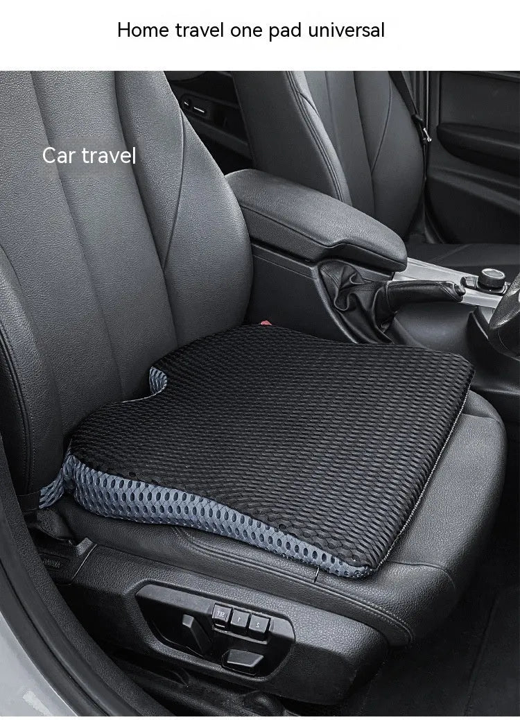 Memory foam seat cushion with adjustable strap shown in creamy white colour