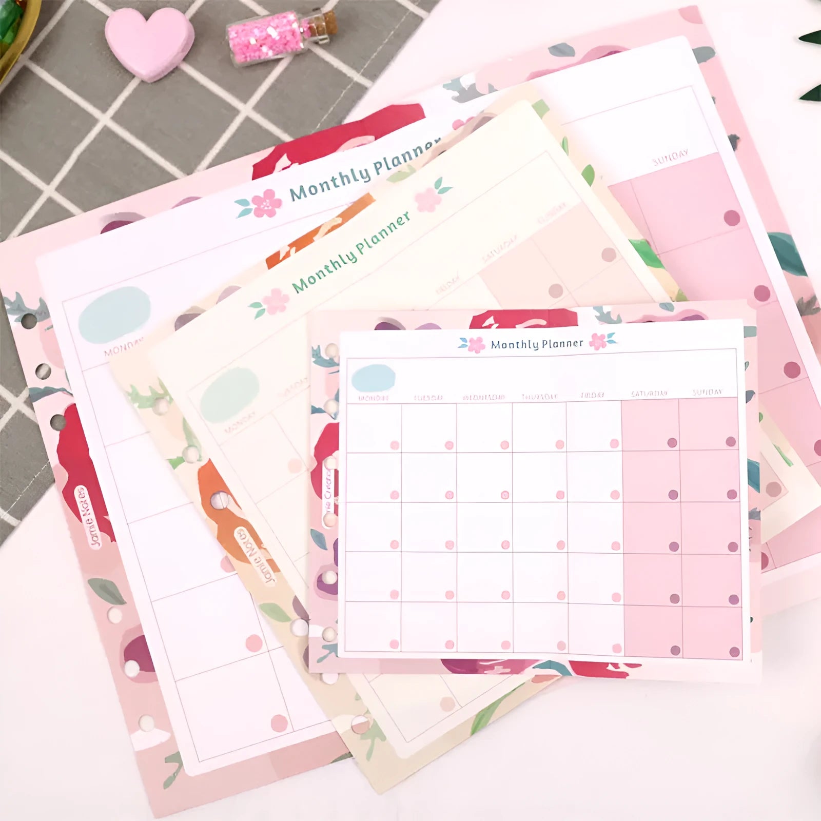 Handbook loose-leaf refill sheets showing floral monthly plan and symphony tri-fold layouts in A5, A6 and A7 sizes