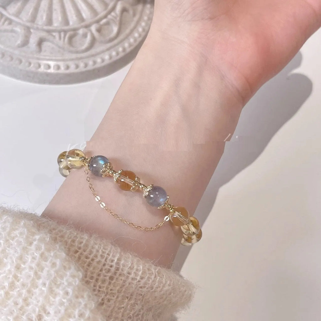 Chinese style women's crystal bracelet with a citrine moonstone and 14K gold electroplating.