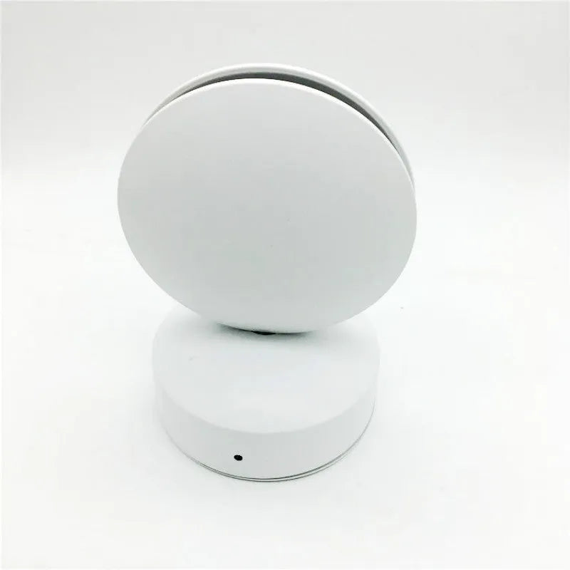 Modern aluminium LED spotlight bar wall lamp with glass lens, shown illuminating a corridor.