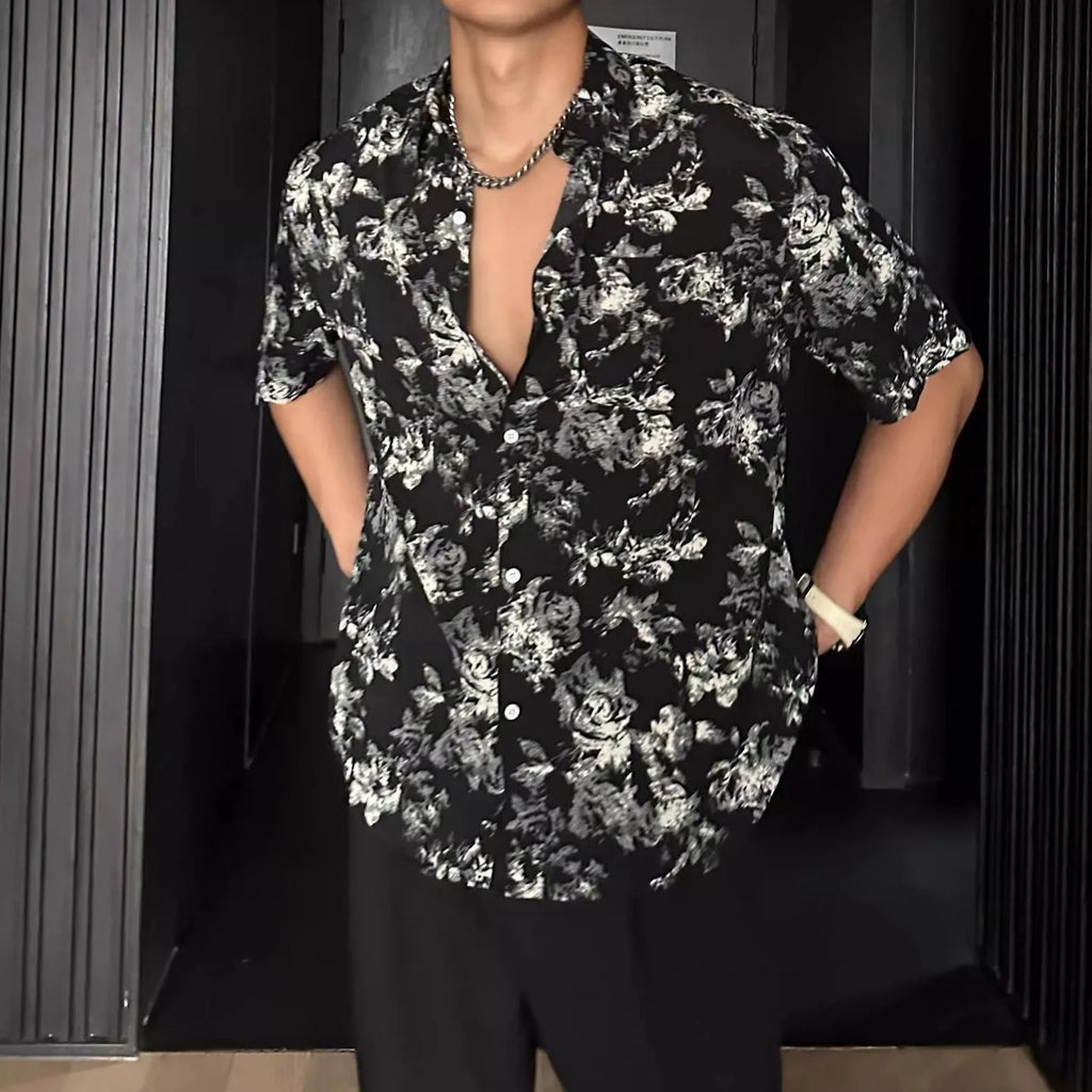 Men's loose black floral print short sleeve casual shirt on a hanger