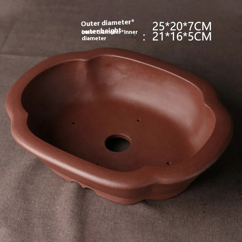 Handmade purple clay bonsai basin with classical Chinese design measuring 25cm long by 20cm wide