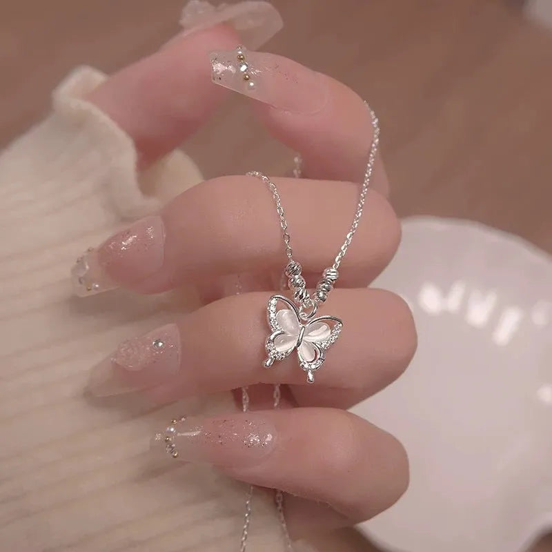 Silver butterfly necklace with opal detail on adjustable 41-50cm chain