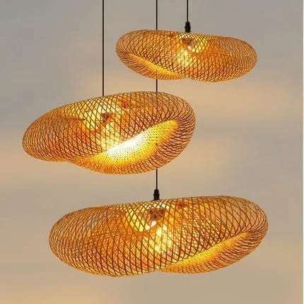 Handmade straw hat-shaped bamboo pendant chandelier hanging from a ceiling