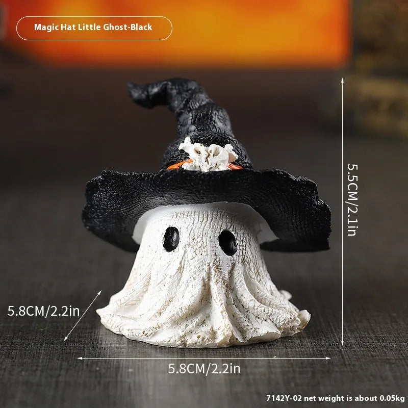 Small resin wizard hat ghost ornament in black or purple for holiday decoration.